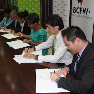 Six people signing MOU documents